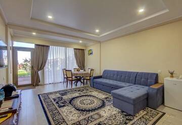 Фото номера Таунхаус с 3 спальнями Отель Karagat Hotel г. Каракол 7