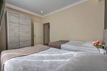 Фото номера Таунхаус с 3 спальнями Отель Karagat Hotel г. Каракол 12