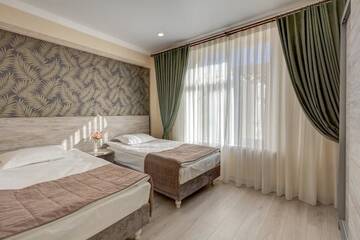 Фото номера Таунхаус с 3 спальнями Отель Karagat Hotel г. Каракол 13