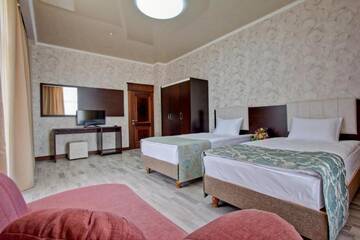 Фото номера Апартаменты с 2 спальнями Отель Karagat Hotel г. Каракол 4