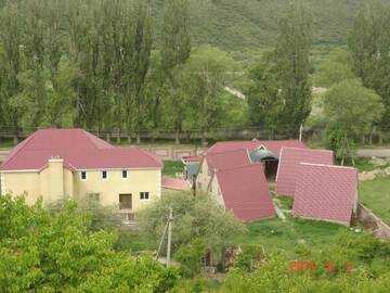 Фото номера Улучшенное шале Шале Kanym Guest Complex г. Каракол 10