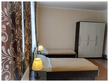 Фото номера Односпальная кровать в общем номере Гостевой дом TwinHouse Karakol г. Каракол 3