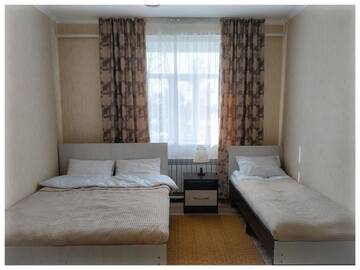 Фото номера Семейный номер Гостевой дом TwinHouse Karakol г. Каракол 2