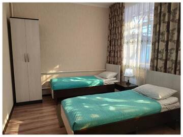 Фото номера Трехместный номер Гостевой дом TwinHouse Karakol г. Каракол 4