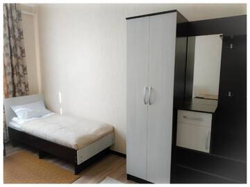 Фото номера Семейный номер Гостевой дом TwinHouse Karakol г. Каракол 5