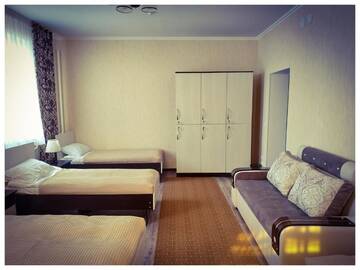 Фото номера Односпальная кровать в общем номере Гостевой дом TwinHouse Karakol г. Каракол 7