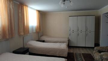Фото номера Односпальная кровать в общем номере Гостевой дом TwinHouse Karakol г. Каракол 3