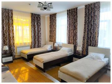 Фото номера Односпальная кровать в общем номере Гостевой дом TwinHouse Karakol г. Каракол 6