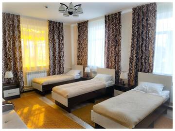 Фото номера Односпальная кровать в общем номере Гостевой дом TwinHouse Karakol г. Каракол 4