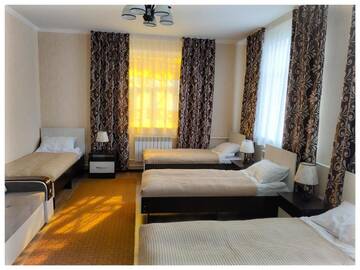 Фото номера Односпальная кровать в общем номере Гостевой дом TwinHouse Karakol г. Каракол 2