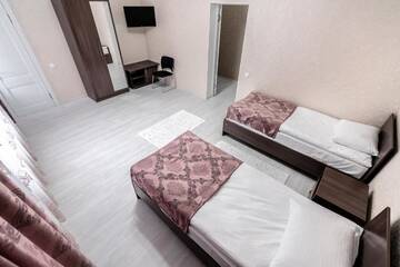 Фото номера Двухместный номер с 2 отдельными кроватями и душем Отель MIXX HOTEL г. Каракол 10