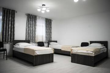 Фото номера Кровать в общем 6-местном номере Отель MIXX HOTEL г. Каракол 4
