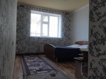 Фото номера Двухместный номер с 2 отдельными кроватями Отель Rahat guest house г. Каракол 7