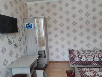 Фото номера Двухместный номер с 2 отдельными кроватями Отель Rahat guest house г. Каракол 8