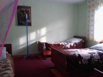 Фото номера Односпальная кровать в общем номере с 6 кроватями Гостевой дом GuesthouseElza in Altyn-Arashan г. Каракол 5